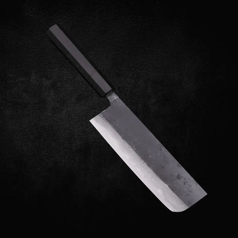 A kurouchi nakiri knife with a black-forged blade 